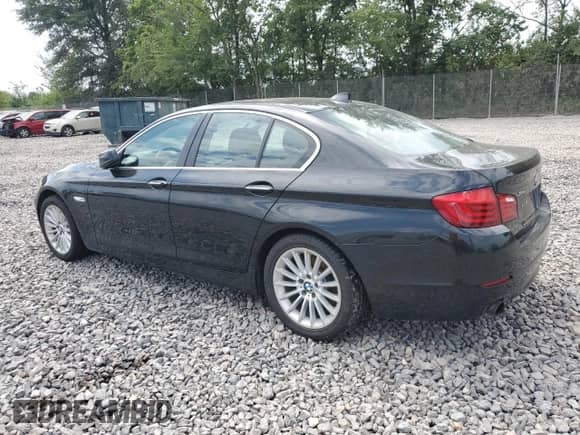 2013 BMW 5 Series 535i xDrive with VIN WBAFU7C5XDDU67159, listed as a Copart auction lot 68189065 with 161,702 mi miles and Salvage title. Bid and sale history available at DreamBid. Image 2.
