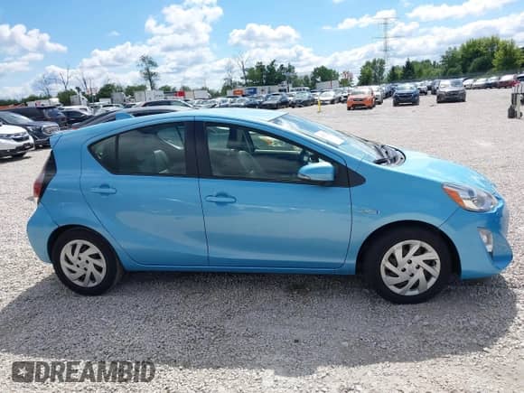 2015 Toyota Prius One z VIN JTDKDTB38F1110142, wystawiony jako IAAI lot #43032276 z przebiegiem Nie podano mil oraz . Historia ofert i sprzedaży dostępna na DreamBid. Obrazek 12.