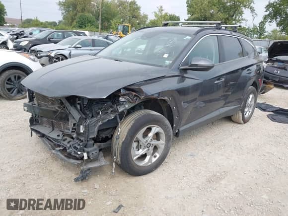 2022 Hyundai Tucson SEL z VIN 5NMJBCAEXNH088945, wystawiony jako IAAI lot #43153690 z przebiegiem 59 495 mil mil oraz . Historia ofert i sprzedaży dostępna na DreamBid. Obrazek 18.