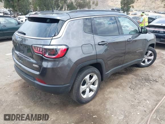 2021 Jeep Compass Altitude with VIN 3C4NJCBB0MT598778, listed as a IAAI auction lot 42416749 with 90,314 mi miles and . Bid and sale history available at DreamBid. Image 4.