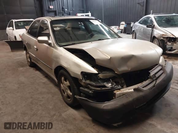 1998 Honda Accord EX with VIN 1HGCG6673WA272112, listed as a IAAI auction lot 41641994 with 188,323 mi miles and . Bid and sale history available at DreamBid. Image 1.