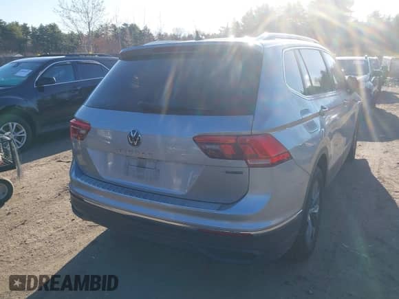 2023 Volkswagen Tiguan SE with VIN 3VVMB7AX4PM128007, listed as a IAAI auction lot 42069544 with 19,994 mi miles and . Bid and sale history available at DreamBid. Image 4.