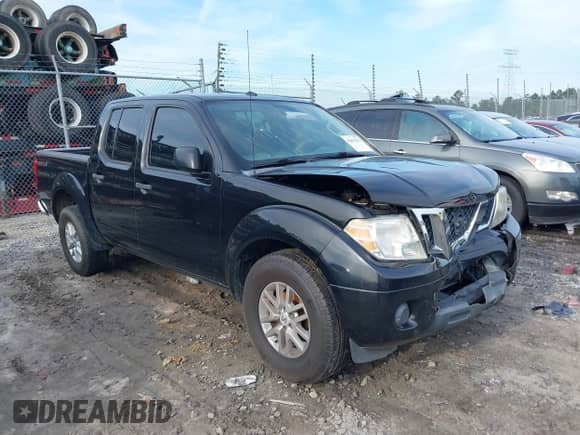 2016 Nissan Frontier SV with VIN 1N6AD0ER4GN790588, listed as a IAAI auction lot 42831191 with 184,461 mi miles and . Bid and sale history available at DreamBid. Image 1.