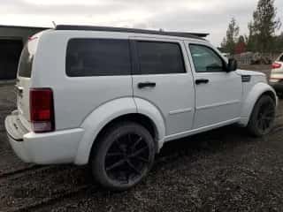 2007 Dodge Nitro R/T с VIN 1D8GT58677W730945, выставлен на аукционе Copart как лот 79094734 с пробегом 186 602 миль миль и Списание • Salvage title. История ставок и продаж доступна на DreamBid. Изображение 3.