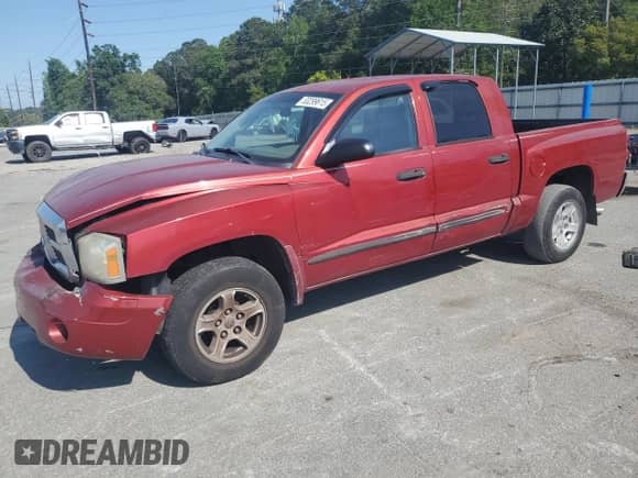 2006 Dodge Dakota SLT с VIN 1D7HE48N16S575464, выставлен на аукционе Copart как лот 65979685 с пробегом 156 658 миль миль и На запчасти • Non repairable. История ставок и продаж доступна на DreamBid. Изображение 1.