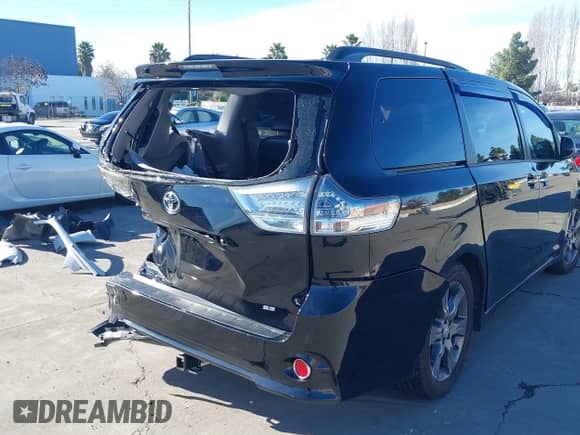 2015 Toyota Sienna SE with VIN 5TDXK3DC4FS583841, listed as a IAAI auction lot 41223820 with 190,117 mi miles and . Bid and sale history available at DreamBid. Image 18.
