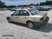 1997 Saturn SL z VIN 1G8ZF5288VZ115030, wystawiony jako Copart lot #80317135 z przebiegiem 259 292 mil mil oraz Szkoda całkowita • Salvage title. Historia ofert i sprzedaży dostępna na DreamBid. Obrazek 2.
