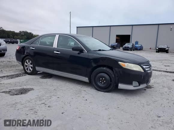 2011 Toyota Camry LE with VIN 4T1BF3EK5BU760466, listed as a Copart auction lot 86335295 with 142,094 mi miles and Salvage title. Bid and sale history available at DreamBid. Image 4.