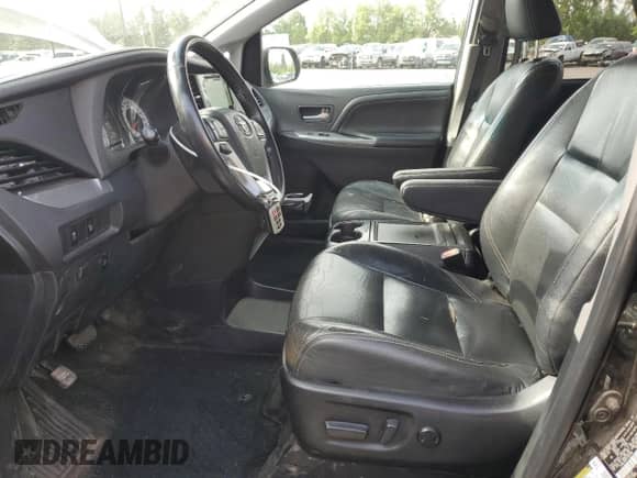 2015 Toyota Sienna SE with VIN 5TDXK3DC8FS650103, listed as a Copart auction lot 60103575 with 124,484 mi miles and Salvage title. Bid and sale history available at DreamBid. Image 7.