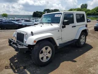 2010 Jeep Wrangler Sahara с VIN 1J4AA5D15AL167384, выставлен на аукционе Copart как лот 64210485 с пробегом 138 320 миль миль и Чистый • Clean title. История ставок и продаж доступна на DreamBid. Изображение 1.