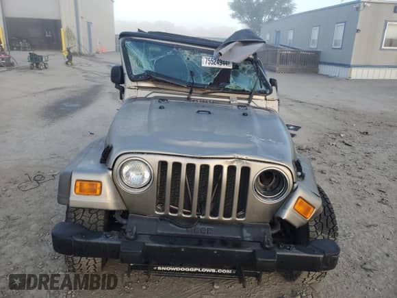2005 Jeep Wrangler SE z VIN 1J4FA29105P344743, wystawiony jako Copart lot #75524944 z przebiegiem 108 824 mil mil oraz Szkoda całkowita • Salvage title. Historia ofert i sprzedaży dostępna na DreamBid. Obrazek 5.