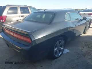 2014 Dodge Challenger SXT с VIN 2C3CDYAG3EH257611, выставлен на аукционе IAAI как лот 43549347 с пробегом 143 540 миль миль и . История ставок и продаж доступна на DreamBid. Изображение 4.