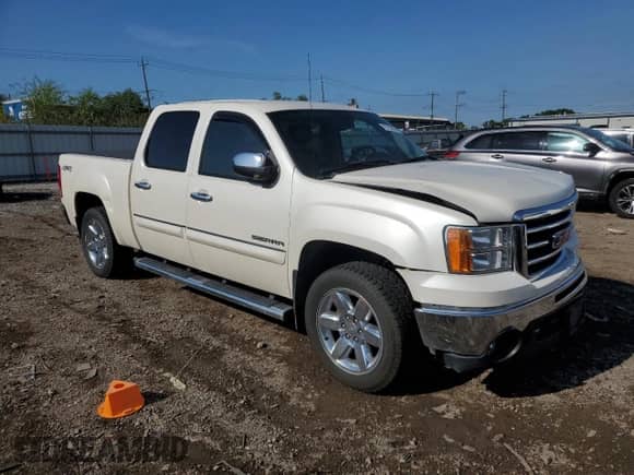 2013 GMC Sierra 1500 SLT с VIN 3GTP2WE7XDG210317, выставлен на аукционе Copart как лот 70132025 с пробегом 128 727 миль миль и Списание • Salvage title. История ставок и продаж доступна на DreamBid. Изображение 4.