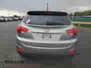 2011 Hyundai Tucson Limited with VIN KM8JUCAC0BU226646, listed as a Copart auction lot 80653715 with 105,174 mi miles and Salvage title. Bid and sale history available at DreamBid. Image 6.