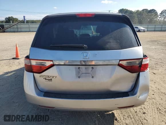 2012 Honda Odyssey LX with VIN 5FNRL5H20CB049254, listed as a Copart auction lot 82322145 with 197,270 mi miles and Salvage title. Bid and sale history available at DreamBid. Image 6.