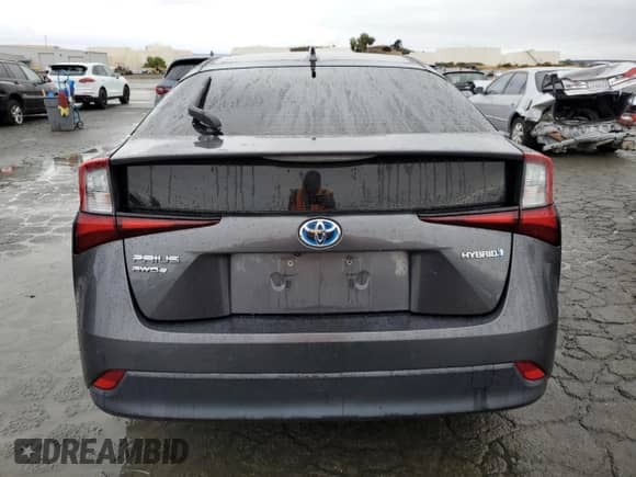 2019 Toyota Prius LE с VIN JTDL9RFU4K3011215, выставлен на аукционе Copart как лот 82524815 с пробегом 130 204 миль миль и Списание • Salvage title. История ставок и продаж доступна на DreamBid. Изображение 6.