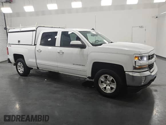 2017 Chevrolet Silverado 1500 LT with VIN 1GCUKRECXHF201593, listed as a Copart auction lot 65596485 with 152,847 mi miles and Clean title. Bid and sale history available at DreamBid. Image 4.