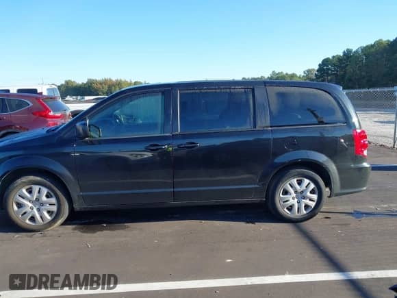 2018 Dodge Grand Caravan SE with VIN 2C4RDGBG2JR173718, listed as a IAAI auction lot 43397892 with 149,137 mi miles and . Bid and sale history available at DreamBid. Image 14.