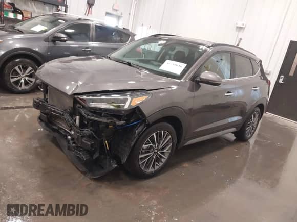 2020 Hyundai Tucson Sport z VIN KM8J3CAL4LU186432, wystawiony jako IAAI lot #41718616 z przebiegiem 26 444 mil mil oraz . Historia ofert i sprzedaży dostępna na DreamBid. Obrazek 2.