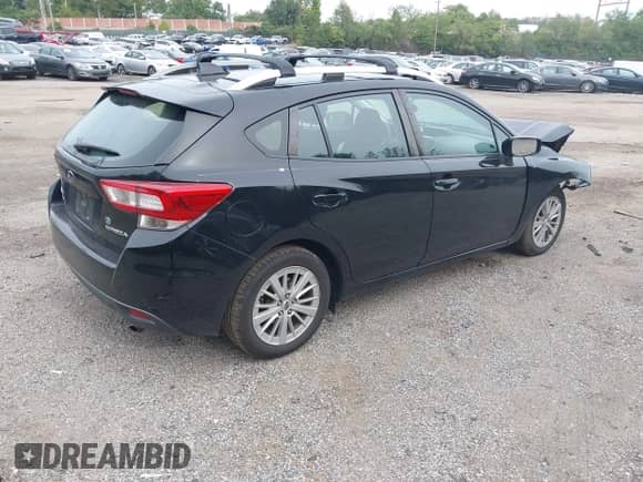 2018 Subaru Impreza Premium with VIN 4S3GTAD60J3702992, listed as a IAAI auction lot 43333897 with 132,811 mi miles and . Bid and sale history available at DreamBid. Image 4.