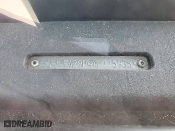 2000 Jeep Wrangler SE with VIN 1J4FA29P4YP775935, listed as a Copart auction lot 80458955 with 100,211 mi miles and Salvage title. Bid and sale history available at DreamBid. Image 13.