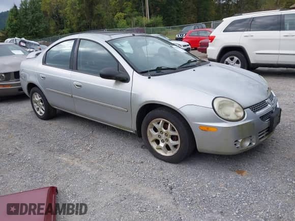 2004 Dodge Neon SXT with VIN 1B3ES56C74D617748, listed as a IAAI auction lot 43390513 with 163,898 mi miles and . Bid and sale history available at DreamBid. Image 1.