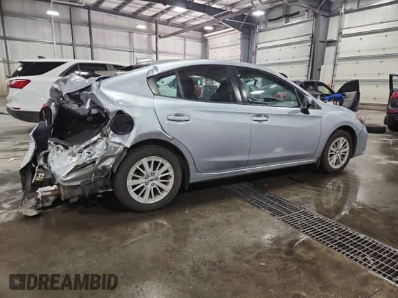 2017 Subaru Impreza Premium с VIN 4S3GKAB61H3609561, выставлен на аукционе Copart как лот 80363265 с пробегом 60 645 миль миль и Списание • Salvage title. История ставок и продаж доступна на DreamBid. Изображение 3.