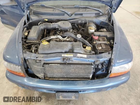 2002 Dodge Durango SLT with VIN 1B4HS48Z32F179672, listed as a Copart auction lot 82214955 with 163,209 mi miles and Salvage title. Bid and sale history available at DreamBid. Image 12.