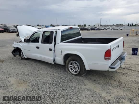 2002 Dodge Dakota Sport z VIN 1B7HL38X92S587514, wystawiony jako Copart lot #81796315 z przebiegiem Nie podano mil oraz Szkoda całkowita • Salvage title. Historia ofert i sprzedaży dostępna na DreamBid. Obrazek 2.