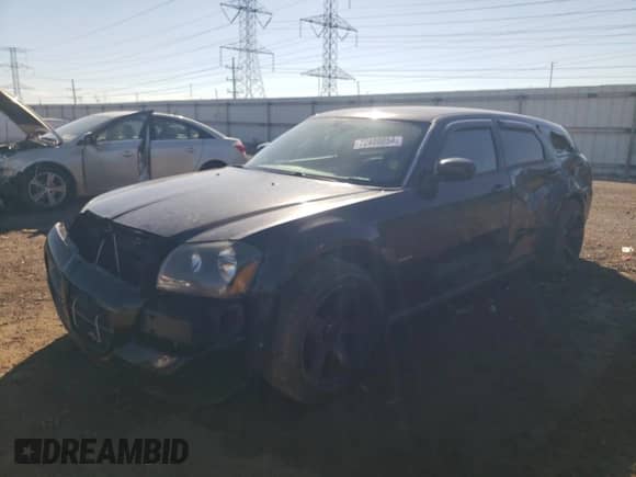 2005 Dodge Magnum RT with VIN 2D4GV58215H587205, listed as a Copart auction lot 72400054 with 115,534 mi miles and Salvage title. Bid and sale history available at DreamBid. Image 1.