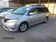 2014 Toyota Sienna LE AAS with VIN 5TDKK3DC0ES457615, listed as a IAAI auction lot 43502655 with 146,897 mi miles and . Bid and sale history available at DreamBid. Image 2.