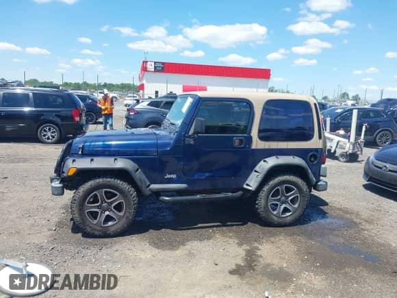 2001 Jeep Wrangler SE with VIN 1J4FA29P01P344644, listed as a IAAI auction lot 42170936 with 130,938 mi miles and . Bid and sale history available at DreamBid. Image 14.