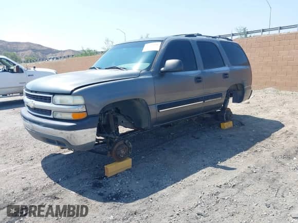 2001 Chevrolet Tahoe LS with VIN 1GNEC13T51J153677, listed as a IAAI auction lot 42459552 with 201,209 mi miles and . Bid and sale history available at DreamBid. Image 2.