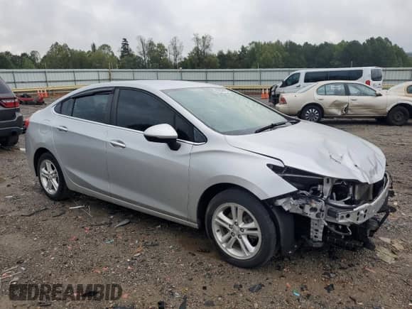 2018 Chevrolet Cruze LT с VIN 1G1BE5SMXJ7164378, выставлен на аукционе Copart как лот 83848465 с пробегом 145 609 миль миль и Списание • Salvage title. История ставок и продаж доступна на DreamBid. Изображение 4.
