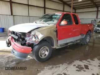 2003 Ford F-150 XL with VIN 1FTRX08L33KD82101, listed as a Copart auction lot 43161485 with 221,823 mi miles and Salvage title. Bid and sale history available at DreamBid. Image 1.