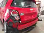 2014 Chevrolet Sonic LT z VIN 1G1JD6SH8E4164720, wystawiony jako IAAI lot #43169999 z przebiegiem 91 833 mil mil oraz . Historia ofert i sprzedaży dostępna na DreamBid. Obrazek 6.