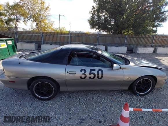 2002 Chevrolet Camaro Z28 z VIN 2G1FP22G322148858, wystawiony jako IAAI lot #43555698 z przebiegiem 89 459 mil mil oraz . Historia ofert i sprzedaży dostępna na DreamBid. Obrazek 13.