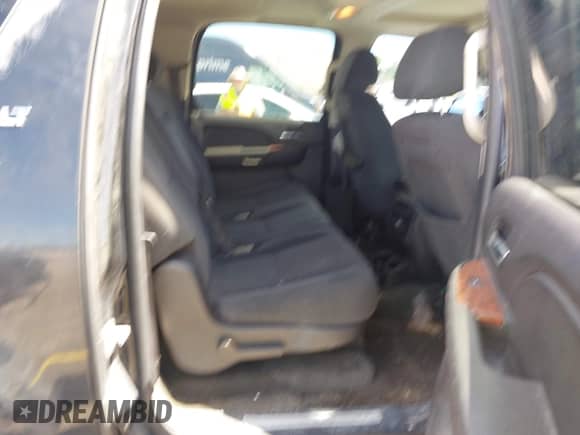 2007 Chevrolet Suburban LTZ z VIN 1GNFK16337J222829, wystawiony jako IAAI lot #42795781 z przebiegiem Nie podano mil oraz . Historia ofert i sprzedaży dostępna na DreamBid. Obrazek 8.