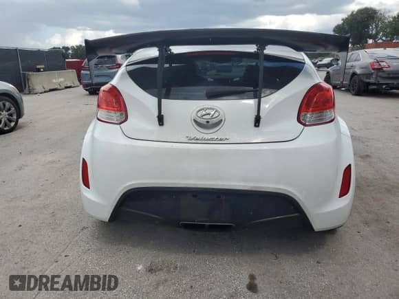 2017 Hyundai Veloster Value Edition z VIN KMHTC6ADXHU323819, wystawiony jako Copart lot #69654695 z przebiegiem 115 450 mil mil oraz Szkoda całkowita • Salvage title. Historia ofert i sprzedaży dostępna na DreamBid. Obrazek 6.