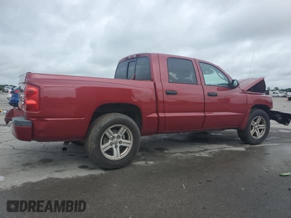 2010 Dodge Dakota Bighorn/Lonestar z VIN 1D7CE3GK3AS263831, wystawiony jako Copart lot #61444305 z przebiegiem 100 902 mil mil oraz Szkoda całkowita • Salvage title. Historia ofert i sprzedaży dostępna na DreamBid. Obrazek 3.