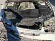 2004 BMW 7 Series 745i with VIN WBAGL63484DP68795, listed as a Copart auction lot 77201084 with 134,044 mi miles and Salvage title. Bid and sale history available at DreamBid. Image 11.