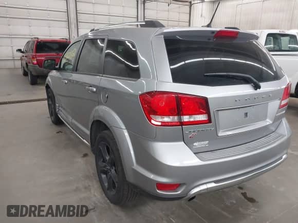 2018 Dodge Journey Crossroad with VIN 3C4PDDGG9JT386354, listed as a IAAI auction lot 43100642 with 168,989 mi miles and . Bid and sale history available at DreamBid. Image 3.