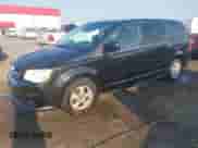 2012 Dodge Grand Caravan Crew z VIN 2C4RDGDG0CR165214, wystawiony jako IAAI lot #43256532 z przebiegiem 96 380 mil mil oraz . Historia ofert i sprzedaży dostępna na DreamBid. Obrazek 2.