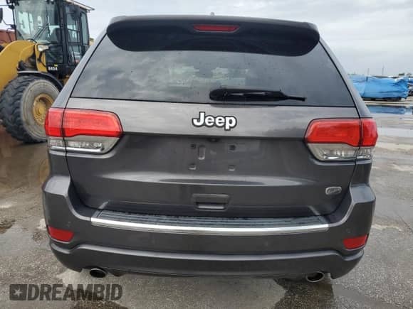2017 Jeep Grand Cherokee Overland with VIN 1C4RJECG5HC605538, listed as a Copart auction lot 81946415 with 100,658 mi miles and Salvage title. Bid and sale history available at DreamBid. Image 6.