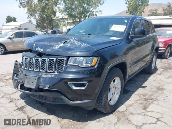 2017 Jeep Grand Cherokee Laredo z VIN 1C4RJFAGXHC651701, wystawiony jako IAAI lot #42478214 z przebiegiem 66 770 mil mil oraz . Historia ofert i sprzedaży dostępna na DreamBid. Obrazek 18.