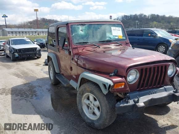 2001 Jeep Wrangler SE with VIN 1J4FA29P21P300094, listed as a IAAI auction lot 41871446 with 125,098 mi miles and . Bid and sale history available at DreamBid. Image 18.