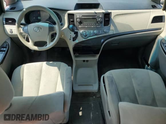 2013 Toyota Sienna L с VIN 5TDZK3DC7DS318742, выставлен на аукционе Copart как лот 66657145 с пробегом 230 411 миль миль и Списание • Salvage title. История ставок и продаж доступна на DreamBid. Изображение 8.