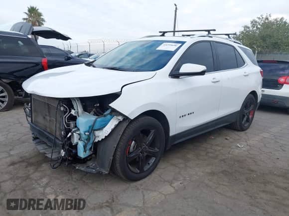 2018 Chevrolet Equinox LT с VIN 2GNAXJEV0J6352926, выставлен на аукционе IAAI как лот 43259696 с пробегом 70 395 миль миль и . История ставок и продаж доступна на DreamBid. Изображение 18.