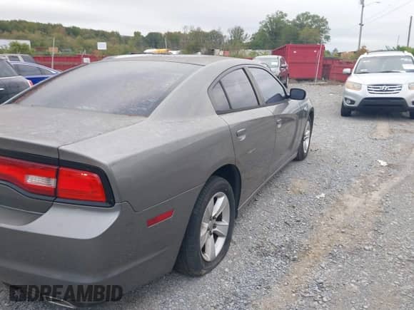 2012 Dodge Charger SE with VIN 2C3CDXBG2CH240031, listed as a IAAI auction lot 43374868 with 203,154 mi miles and . Bid and sale history available at DreamBid. Image 4.