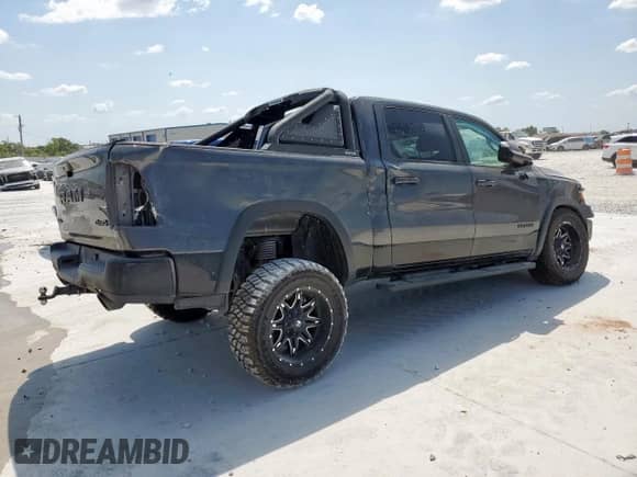 2020 Ram 1500 Rebel z VIN 1C6SRFLT2LN199221, wystawiony jako Copart lot #68965755 z przebiegiem 49 714 mil mil oraz Szkoda całkowita • Salvage title. Historia ofert i sprzedaży dostępna na DreamBid. Obrazek 3.